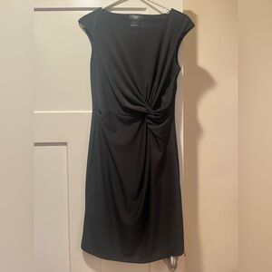 Women’s black dress, shirred at side waist, pulls over, no zip.  Medium.